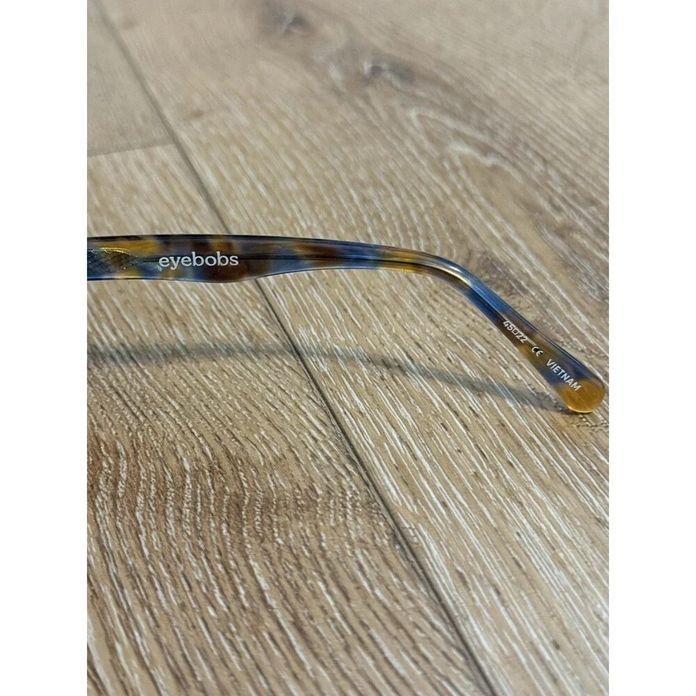 Eyebobs glasses frame TV Party Amber with blue & yellow camo pattern arms